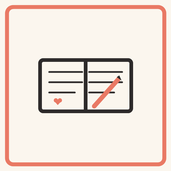 Open journal with a pen and a heart