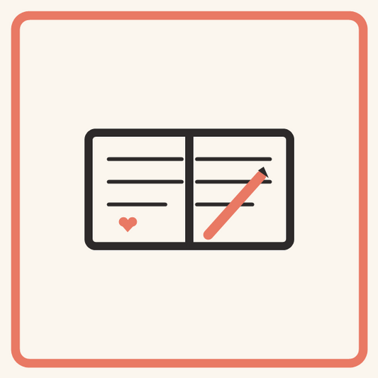 Open journal with a pen and a heart