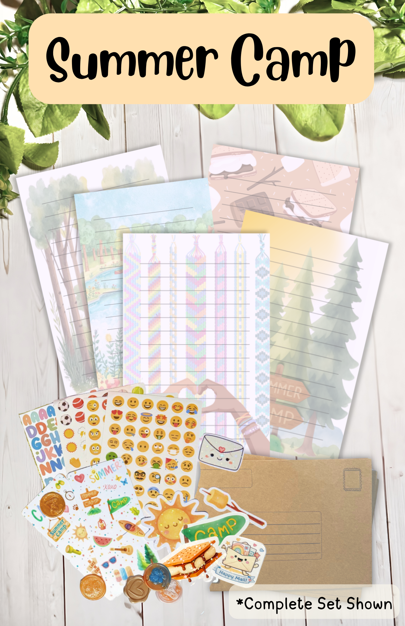 Kids stationery set spread with themed paper, stickers, and envelopes