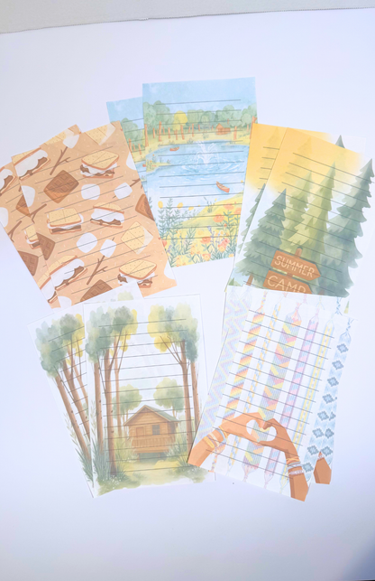 Summer Camp stationery set with woods, cabin, s'more, friendship bracelet, lake, and canoe themes